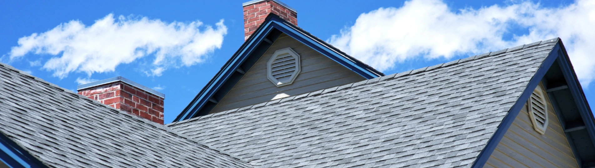 residential house with newly installed asphalt roof shingles